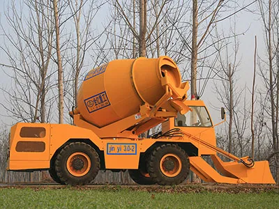 Self-loading concrete mixer 
